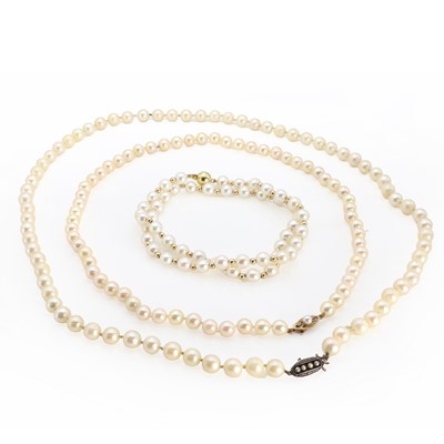 Lot 1220 - Three single row uniform cultured pearl necklaces