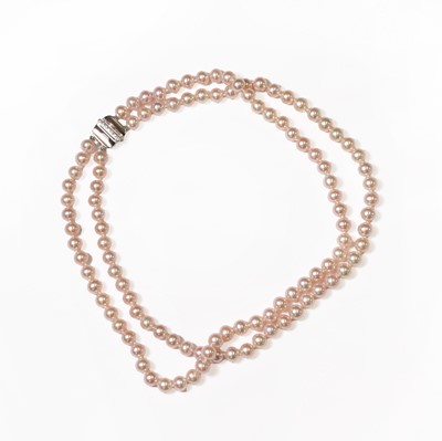 Lot 1213 - A uniform two row pink freshwater pearl necklace