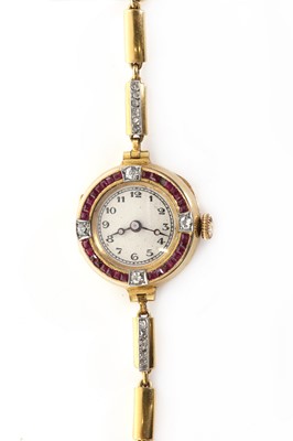 Lot 295 - A French ruby, diamond and 18ct gold cocktail watch