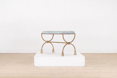Lot 204 - An upholstered brass stool