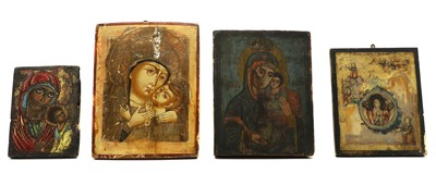 Lot 203 - A group of four painted icons