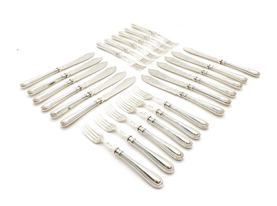 Lot 33 - A composed set of twelve fish knives and forks