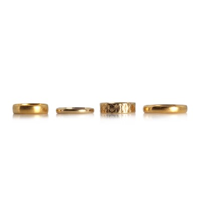 Lot 1286 - Four gold wedding rings