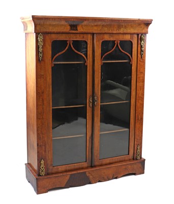 Lot 483 - A walnut cabinet