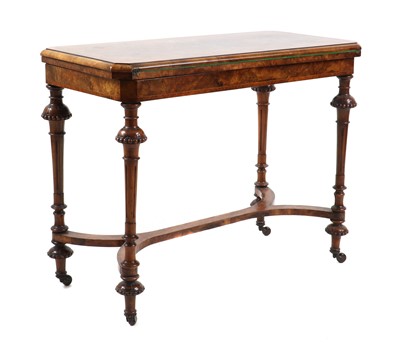 Lot 355 - A Victorian figured walnut card table