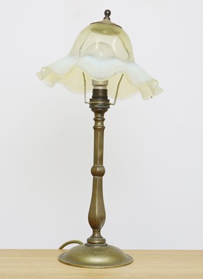 Lot 210 - A straw opalescent glass table lamp