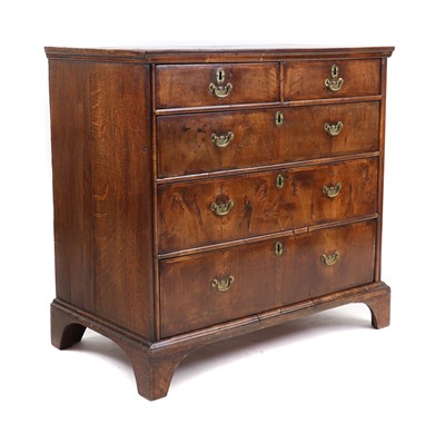 Lot 372 - A walnut chest of drawers