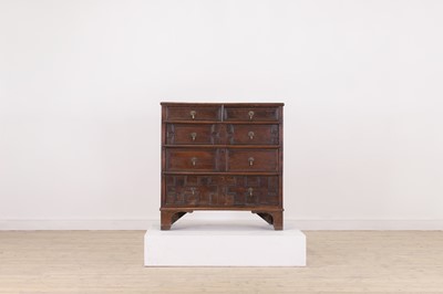 Lot 293 - A Transitional oak chest of drawers