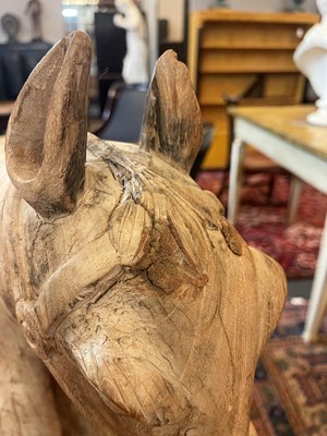 Lot 61 - A stripped teak pull-along horse