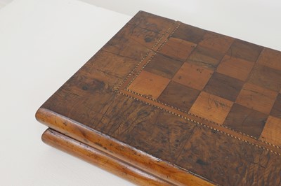 Lot 91 - A yew and specimen wood games box