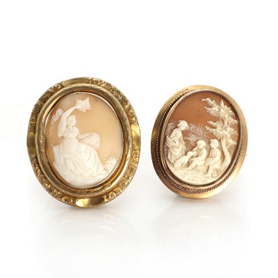 Lot 145 - A cameo brooch depicting a country scene, and another with a seated figure