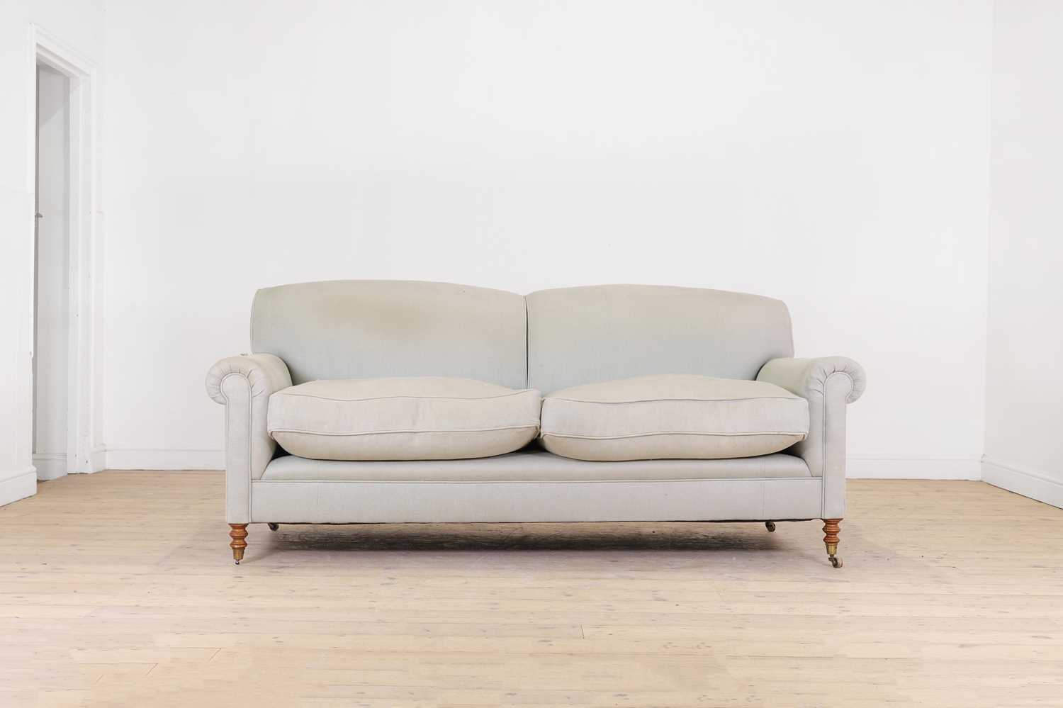 Lot 374 - A two-seater sofa by George Smith