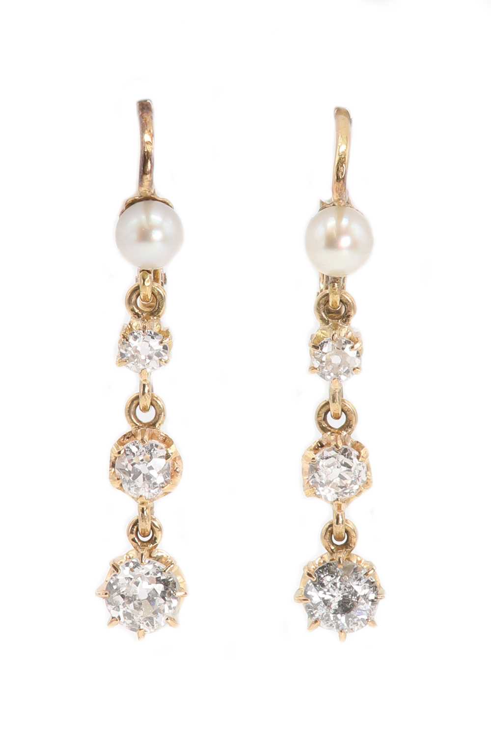 Lot 35 - A pair of early 20th century Continental gold, pearl and diamond drop earrings