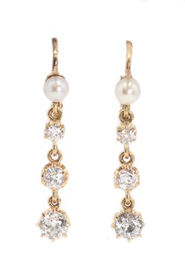 Lot 35 - A pair of early 20th century Continental gold, pearl and diamond drop earrings
