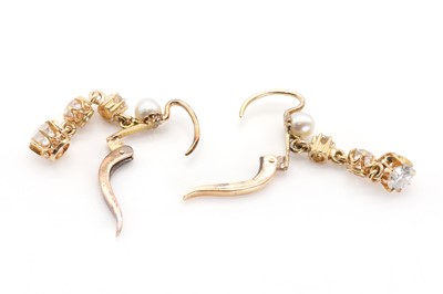 Lot 35 - A pair of early 20th century Continental gold, pearl and diamond drop earrings
