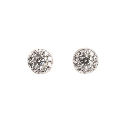 Lot 1082 - A pair of 18ct white gold diamond cluster ear studs
