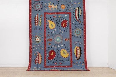 Lot 49 - A suzani-inspired flat-weave rug
