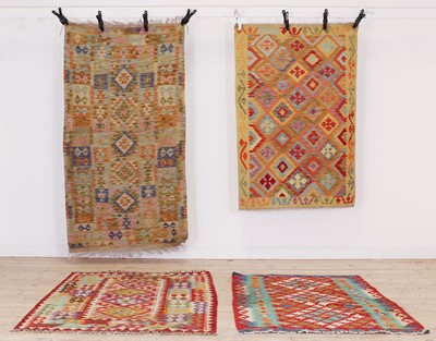 Lot 275 - A group of four kilim rugs