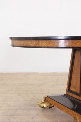 Lot 476 - A burr oak and ebony centre table in the manner of George Bullock