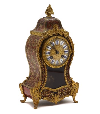 Lot 273 - A faux tortoiseshell and gilt-metal Boulle mantel clock