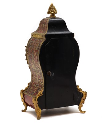 Lot 273 - A faux tortoiseshell and gilt-metal Boulle mantel clock