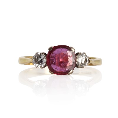 Lot 70 - An 18ct gold ruby and diamond three stone ring