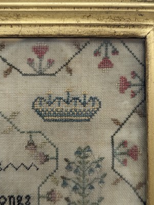 Lot 179 - A needlework sampler