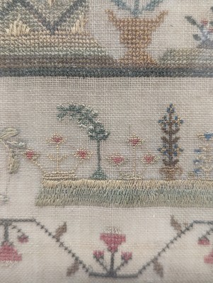 Lot 179 - A needlework sampler