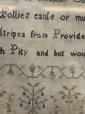 Lot 179 - A needlework sampler