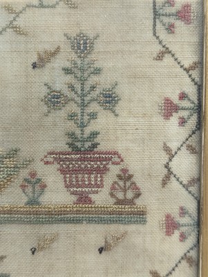 Lot 179 - A needlework sampler