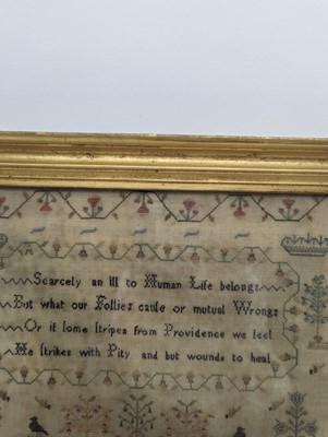 Lot 179 - A needlework sampler