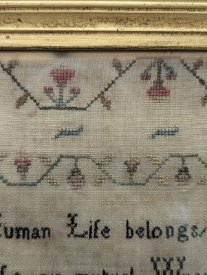 Lot 179 - A needlework sampler