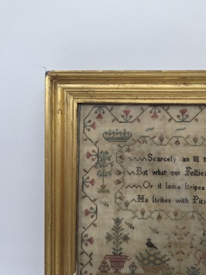 Lot 179 - A needlework sampler