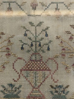 Lot 179 - A needlework sampler