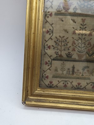 Lot 179 - A needlework sampler