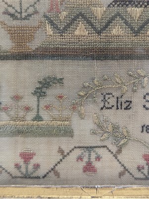 Lot 179 - A needlework sampler