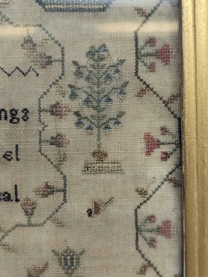 Lot 179 - A needlework sampler