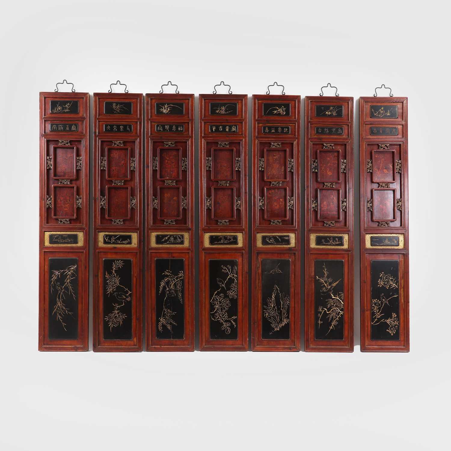 Lot 154 - A set of eight stained, lacquered and gilt wooden panels