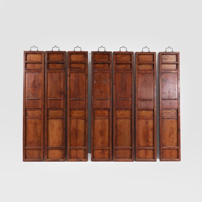 Lot 154 - A set of eight stained, lacquered and gilt wooden panels