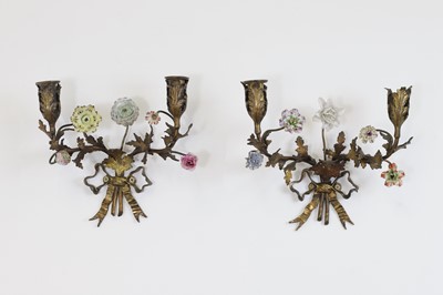 Lot 209 - A pair of Louis XV-style ormolu and porcelain wall lights