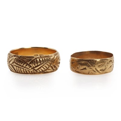 Lot 1238 - Two 18ct gold textured band rings