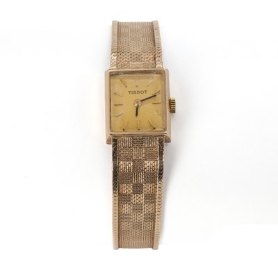 Lot 298 - A ladies' 9ct gold Tissot mechanical bracelet watch