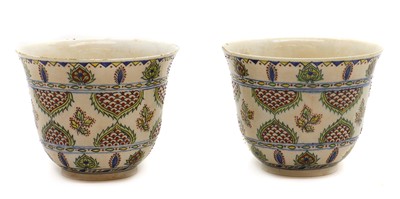 Lot 99 - A pair of Samson pottery vases