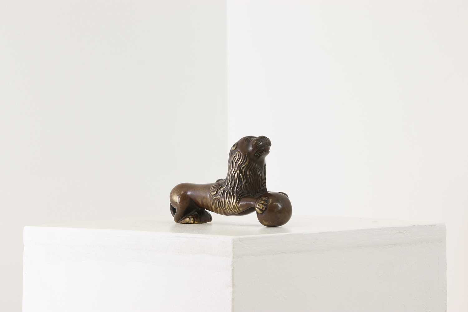 Lot 603 - A bronze door knocker,