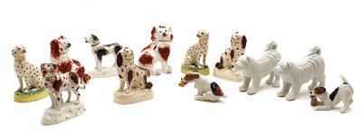 Lot 84 - A group of pottery dogs