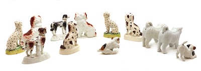 Lot 84 - A group of pottery dogs