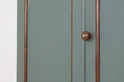 Lot 628 - A painted pine cupboard