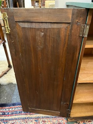 Lot 628 - A painted pine cupboard