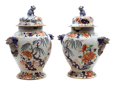 Lot 92 - A pair of Stone China baluster vases and covers