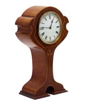 Lot 276 - An Art Nouveau inlaid mahogany balloon mantel clock